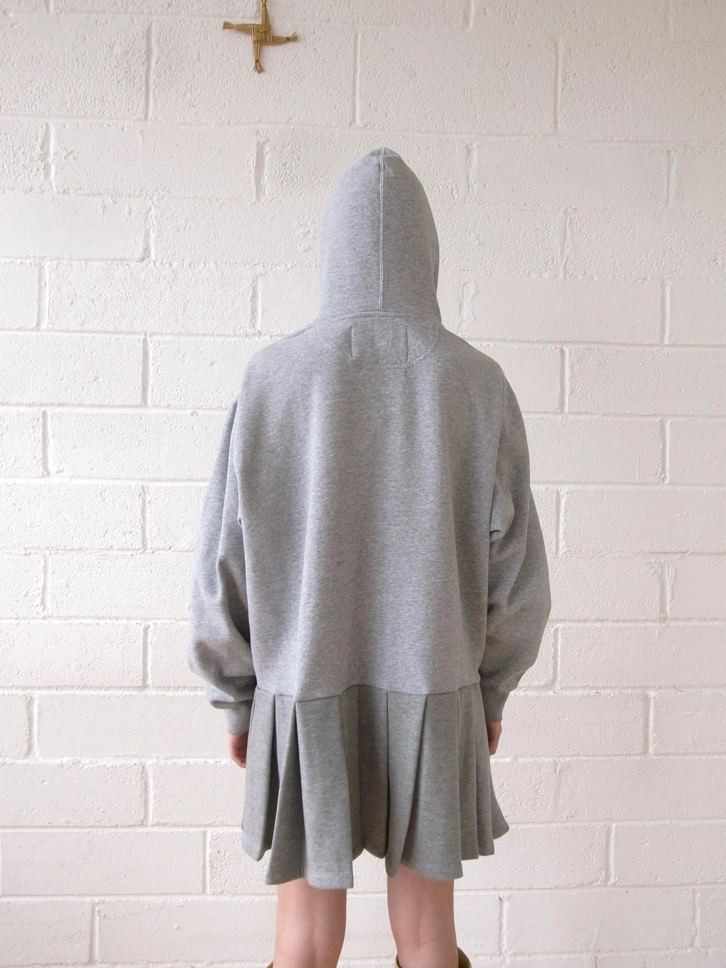 The Reconstituted Jersey Pleated Skirt Sweatshirt